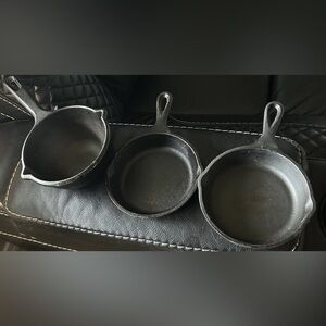 3 - Lodge, Mini Cast Iron Pieces.  2 - 5”Skillets, 1 - 4.5” Melting Pot